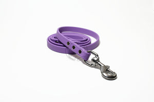 Amethyst purple dog leash with orchid purple accents. Made from durable biothane coated webbing. Features stainless steel or solid brass hardware. Custom length, handmade and waterproof. Vegan-friendly. Width: 5/8" (16mm). Strong and long-lasting.
